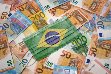 Medical mask with the flag of Brazil on a variety of european banknotes.(series)