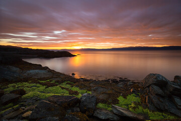Fototapeta na wymiar Beautiful sunset conditions by the fiord in Norway