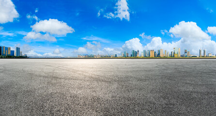 Fototapeta premium Race track road and modern city skyline with buildings in Hangzhou.