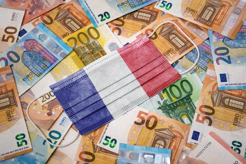 Medical mask with the flag of French Guiana on a variety of european banknotes.(series)