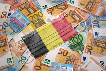 Medical mask with the flag of Belgium on a variety of european banknotes.(series)