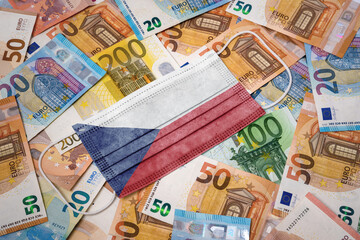 Medical mask with the flag of Czech Republic on a variety of european banknotes.(series)