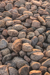 Round stones in a sunset