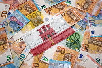 Medical mask with the flag of Gibraltar on a variety of european banknotes.(series)