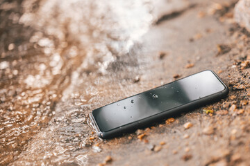 Smartphone on a beach sand