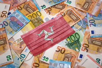 Medical mask with the flag of Isle of Man on a variety of european banknotes.(series)