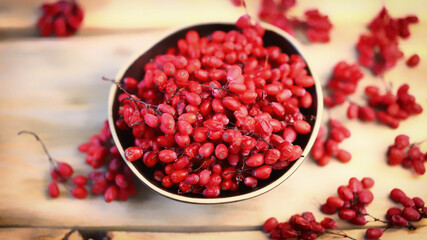 Barberry in a bowl. Seasoning for dishes is fresh barberry.