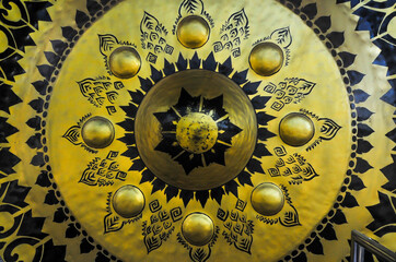 Fullframe background texture of Buddhist Gong at Wat Khositaram temple ,Chai Nat province,Thailand 