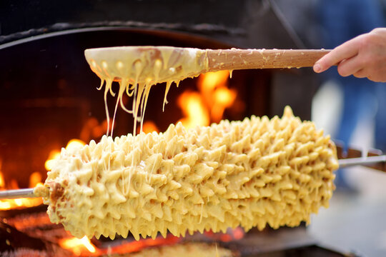 Traditional Lithuanian tree cake called sakotis baked at annual Easter fair in Vilnius, Lithuania