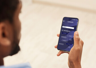 Unrecognizable Black Man Having Online Lesson In Educational App On Smartphone