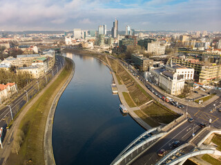 Beautiful sunny Vilnius city scene in winter. Aerial early morning view.