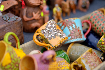 Ceramic dishes, tableware and jugs sold on Easter market in Vilnius. Lithuanian capital's traditional crafts fair is held every March on Old Town streets.