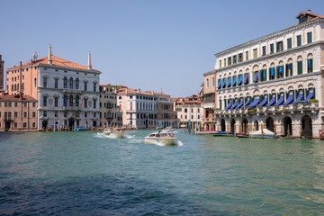 Fototapeta na wymiar Panoramic view of Grand Canal (Canal Grande) with active traffic boats