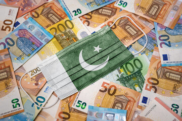 Medical mask with the flag of Pakistan on a variety of european banknotes.(series)