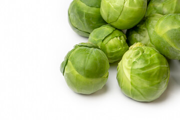 Fototapeta premium Green fresh brussels sprouts on the white background