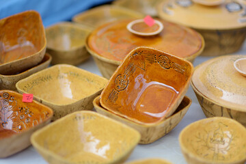 Ceramic dishes, tableware and jugs sold on Easter market in Vilnius. Lithuanian capital's traditional crafts fair is held every March on Old Town streets.