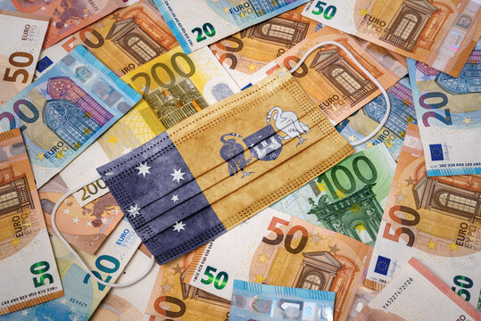 Medical mask with the flag of Australian Capital Territory on a variety of european banknotes.(series)