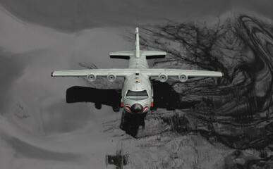 model of a military aircraft on a black background