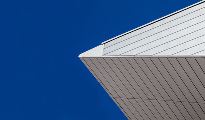 white architecture detail against blue sky