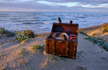 treasure chest at the beach in a sunrise