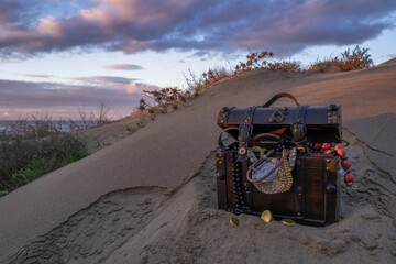 treasure chest at the beach in a sunrise