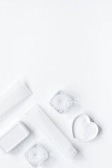 monochrome cosmetic set for SPA on white background top view mock up