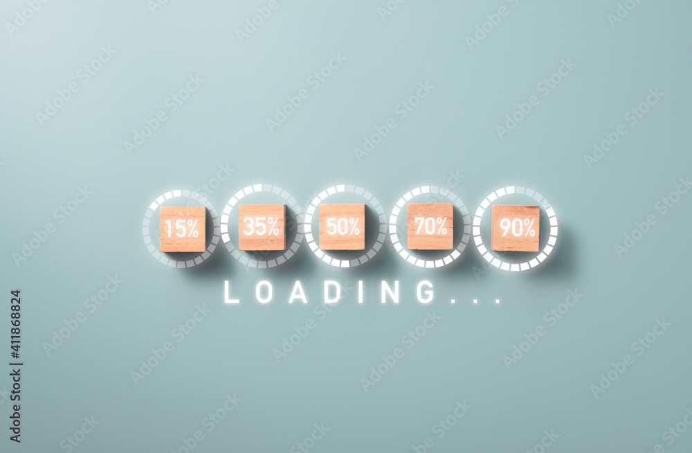 Fototapete Loading percentage print screen on wooden cube block with blue background , Electronic download upload and business project progressive concept.