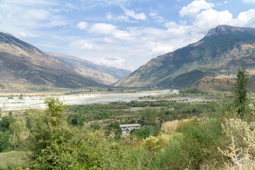 Fototapeta na wymiar The Drino River Valley in summer, low water level. Albania, Tepelene District, Europe.