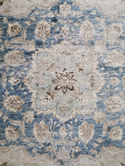 shabby carpet top view. the effect of an aged carpet. vintage texture for interior decor.