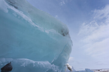 Ice hummocks on Lake Bolshoe Krasnoyarsk Krai Siberia Sunny day blue sky white snow azure...