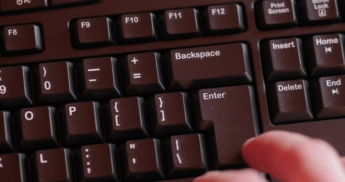 Hitting the Enter key on a keyboard over and over again, repeatedly, many times