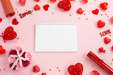 Notebook for writing with red hearts, gifts and candles.