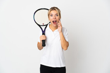 Young Russian woman tennis player isolated on white background with surprise and shocked facial...