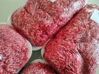1 kg of fresh beef in a package, packaged ground beef,