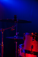 Fototapeta na wymiar Drums in concert - on stage - in LED lights
