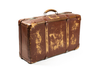 Vintage style. Antiquated and used suitcase  isolated on white background