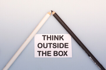 The text think outside the box . Life and business motivational inspirational concept