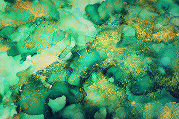 Fototapeta na wymiar art photography of abstract fluid art painting with alcohol ink, green and gold colors