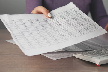 woman hand pen with document on working desk