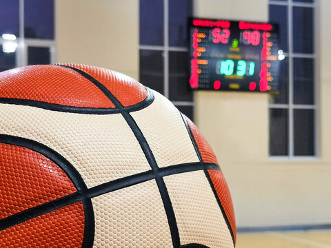 basketball ball and scoreboard