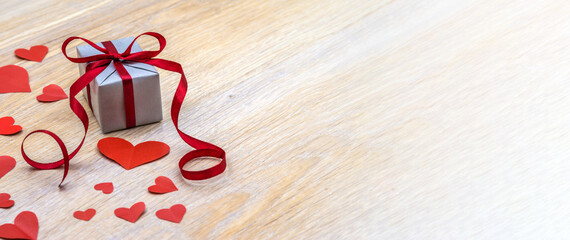 Holiday package with a heart. A handmade gift. Gift wrapping.