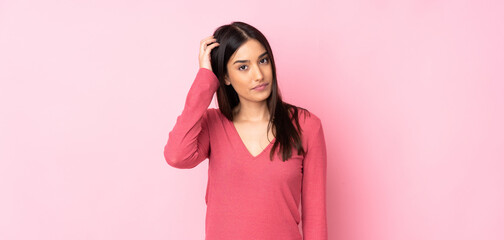 Young caucasian woman over isolated background with an expression of frustration and not...