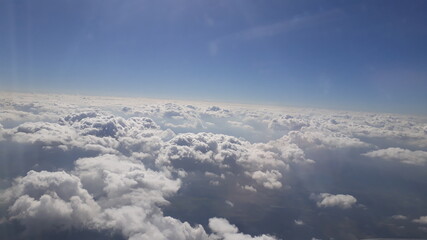 Obraz na płótnie Canvas Aerial View Of Clouds In Blue Sky