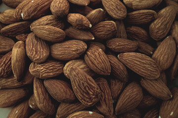Peeled almonds closeup. For vegetarians.