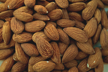 Peeled almonds closeup. For vegetarians.