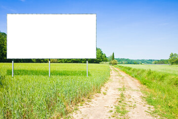 Blank advertising billboard immersed in a rural scene - image with copy space