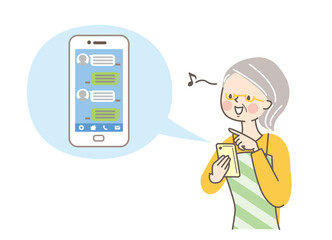 スマホでメールをするシニア女性