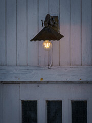 Outdoor lamp of abandoned house.