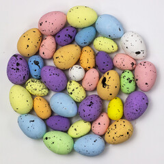 Decorated quail eggs in the shape of a circle