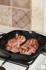 Raw beef steak in grill pan